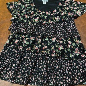 Adorable flirty summer blouse.